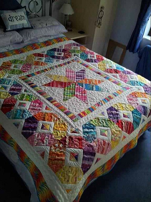 Rainbow Starburst Quilt – A Celebration of Color and Craft