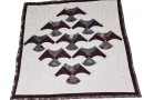 Bluebird Flight Quilt: A Graceful Dance in Fabric
